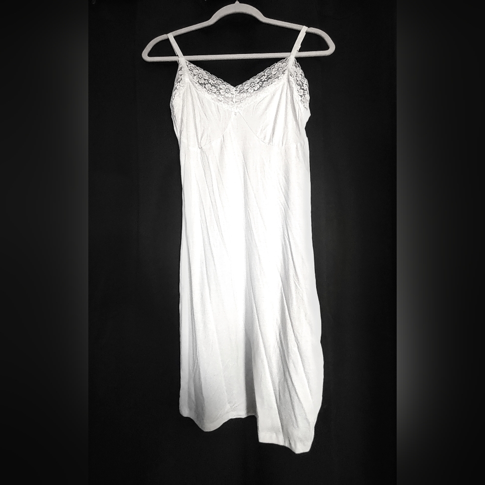 never worn lace dress slip or night gown, very light weight